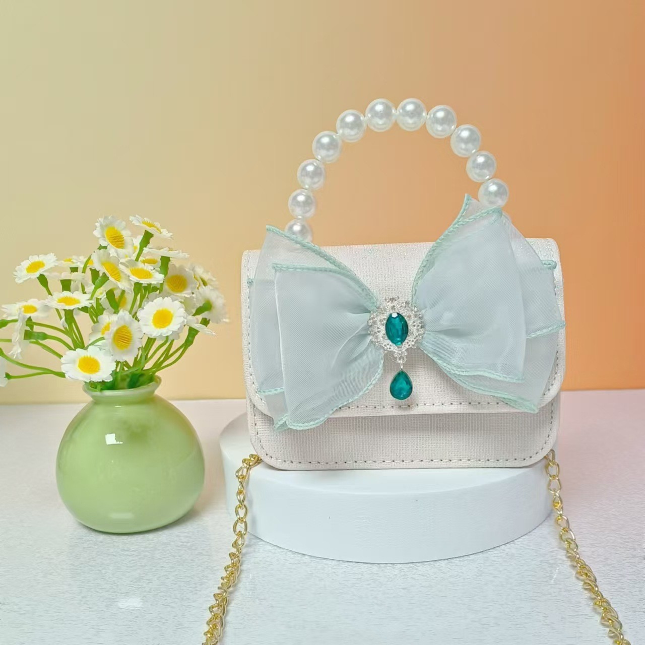 Bagos de perlas para niños 2025 nuevos bolsos de niños bolsos de mochila de niñas bolsos accesorios de princesa bolsos de viento de fragancia