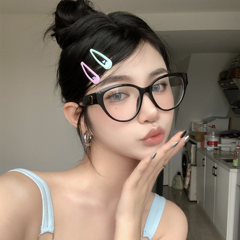 Nuevo de gama alta amor retro ojo de gato celebridad de Internet gafas de moda todo-fósforo UV a prueba de gafas de sol