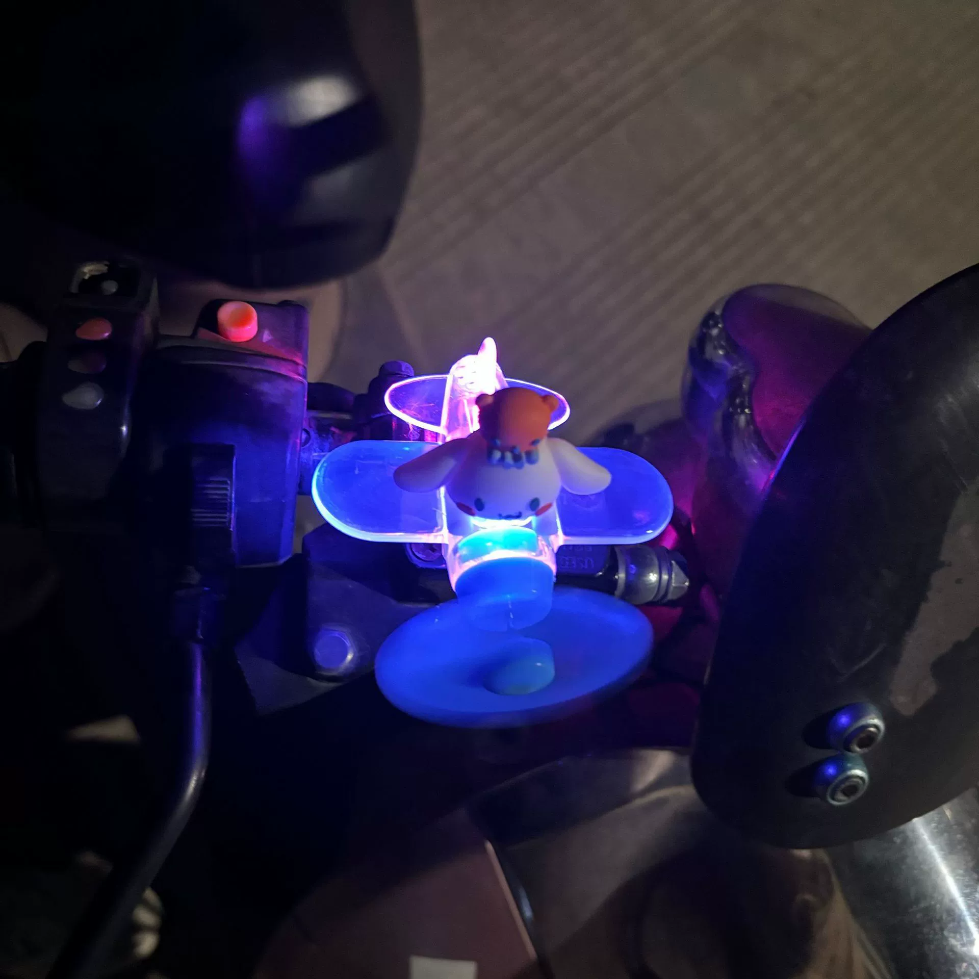 Electric car, glowing airplane, rotating decorations, generating electricity