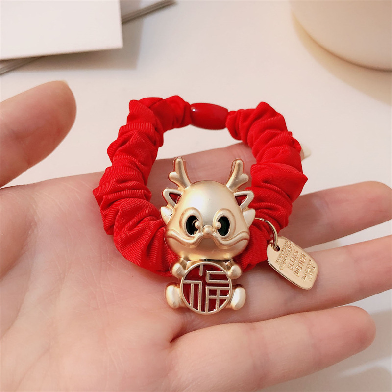 Año del Dragón Zodiaco de alta sensación metal rojo Año Nuevo anillo de cabello de alta altura cuerda elástica cuerda de cabello festiva adornos para el cabello