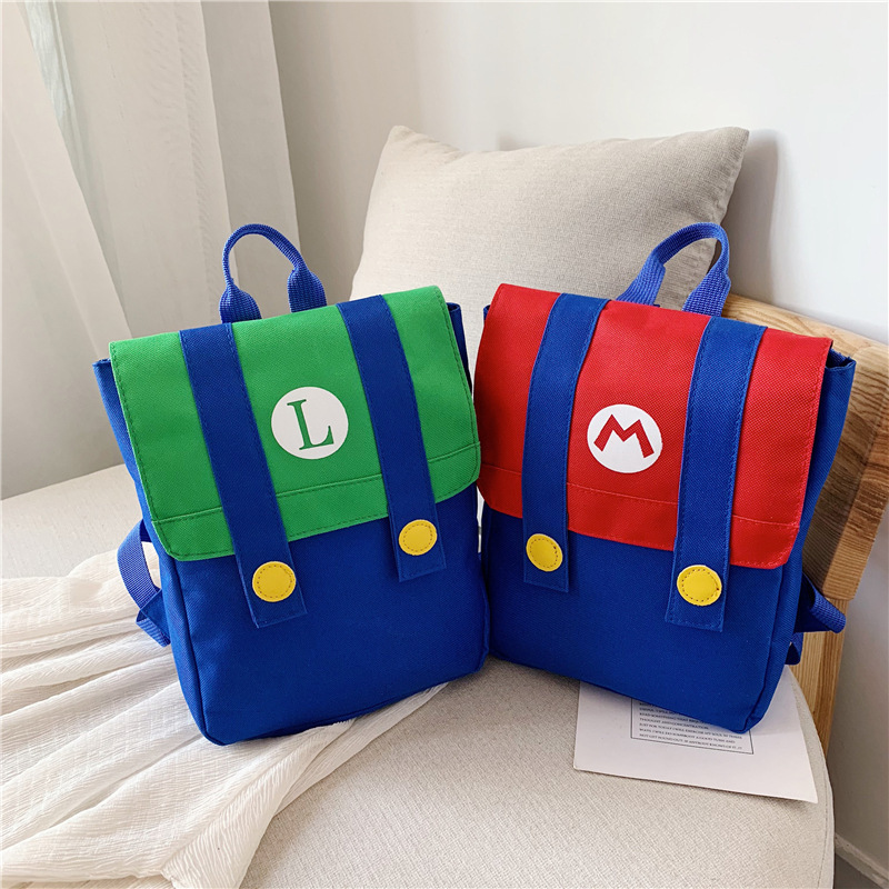 Nueva mochila infantil de estilo coreano con letras de dibujos animados impresas con LOGO, mochila para niños y niñas, mochila escolar de colores contrastantes para jardín de infantes