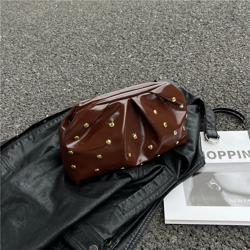 Plegado versátil punto de onda de moda simple bolso de cena de mujer estilo de la República de China retro ocio de alto grado temperamento bolso de mano