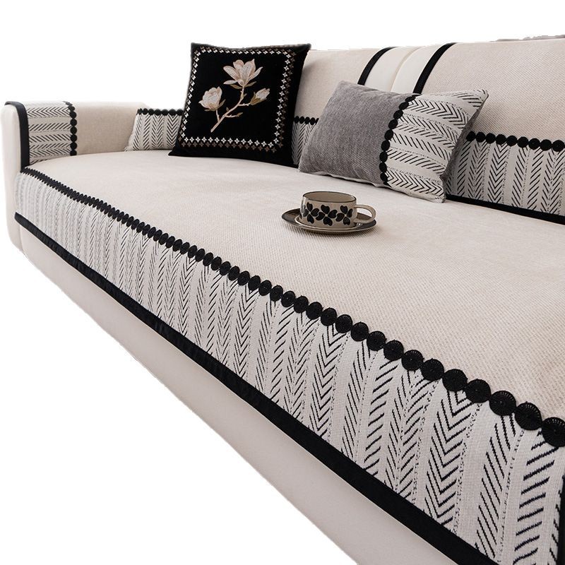 Sofá de aire crema cojín de cuatro estaciones generales 2024 nueva toalla de cubierta de sofá de cuero antideslizante cojín de snowboard