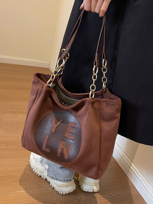 Bolso de gran capacidad para mujeres 2024 nuevo otoño y invierno de moda letras de colisión de color bolso de hombro universal bolso de clase