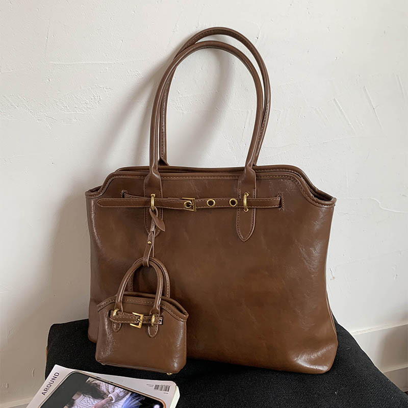 2025 otoño y invierno nueva gran capacidad de transporte bolsa bolsa de mano maletín retro bolso de hombro bolsa de compras de alta calidad