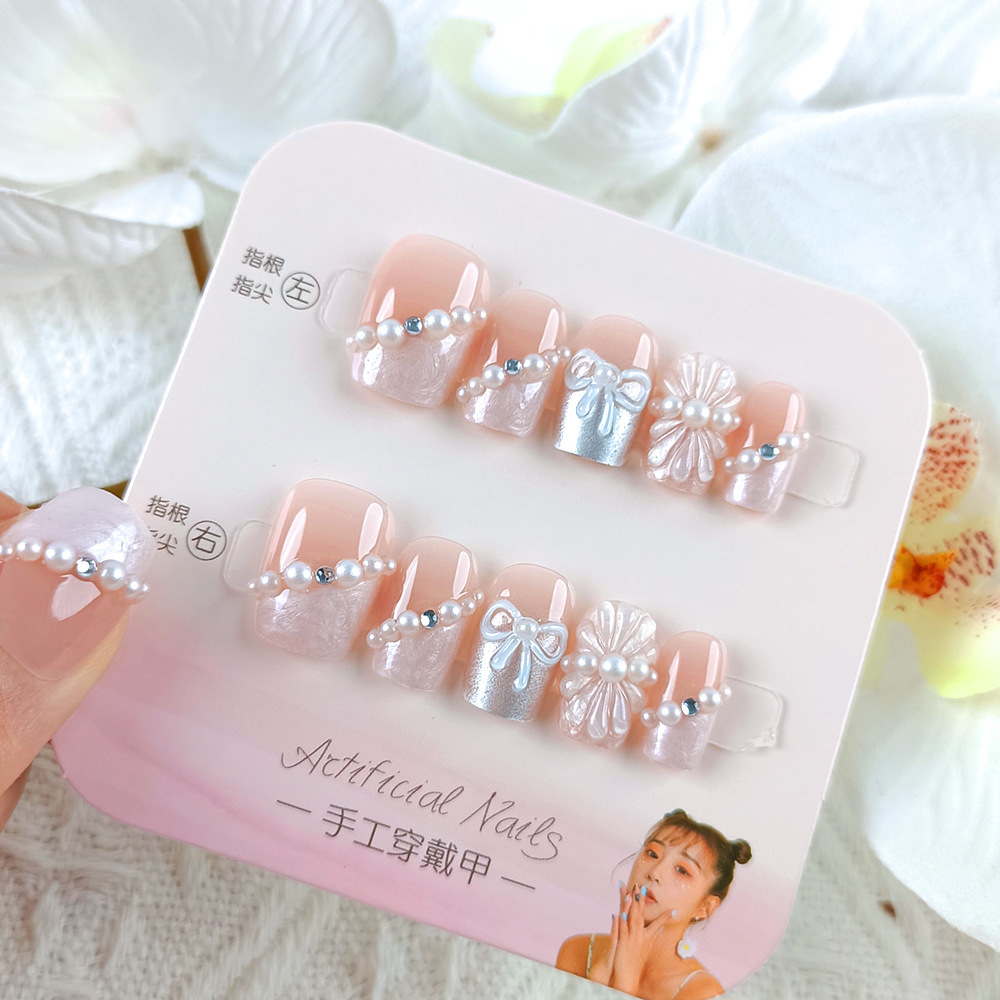 Manicura de Año Nuevo, 10 piezas de diamantes de perlas hechos a mano, arte de uñas portátil, parche de uñas Xiaohongshu, venta al por mayor