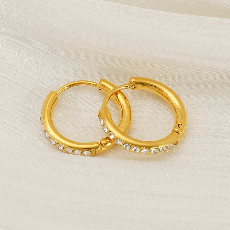 Pendientes de acero de titanio de estilo europeo y americano de oro de 18 quilates para niñas, lujo ligero de alta calidad, botones de oreja que no se desvanece, pendientes de acero inoxidable para mujeres