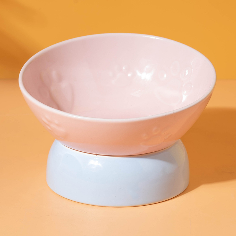 Tazón en relieve con garra inclinada con pies (tazón rosa con pies azules)