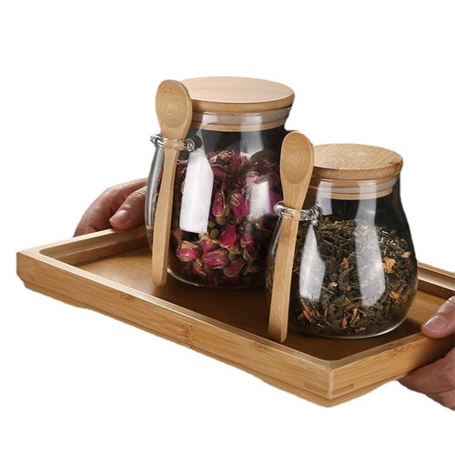 Manufacturer wholesale transparent glass snack storage jar with wooden lid glass big belly cereal sealed jar with spoon tea jar