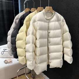 冬新款羽绒服女中长款针织拼接泡芙韩版宽松黄色方块圆领外套新品