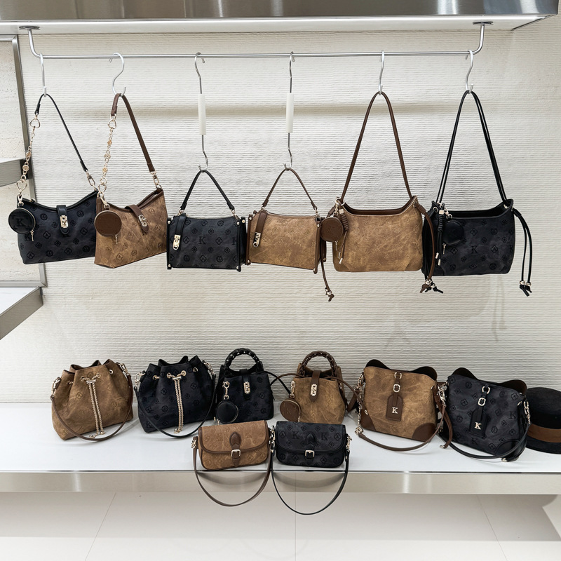 古缇蔻跨境厂家批发老花新款压印水桶优雅流苏时尚女士手提包包