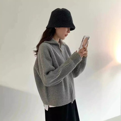 クロスボーダーの新しい純色の坑条の双ファスナーのデザイン感は肩の長袖のニットのコートの女性の純色の簡単なセーターの女性を挿し込みます。