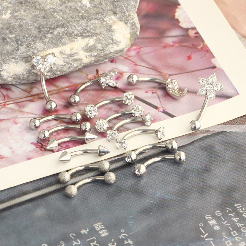 Silver pointed spike labret stud material detail