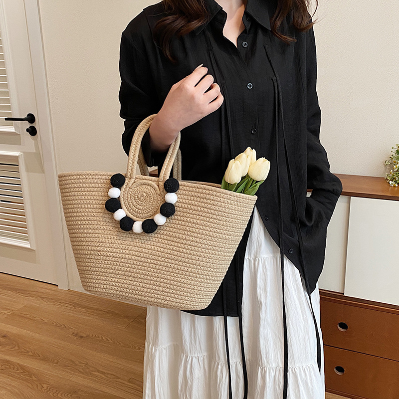 Una pieza de envío, versión coreana del bolso tejido de paja con cuerda de algodón, bolsa tejida con canasta de bolas de lana, bolsa de textura de alta calidad
