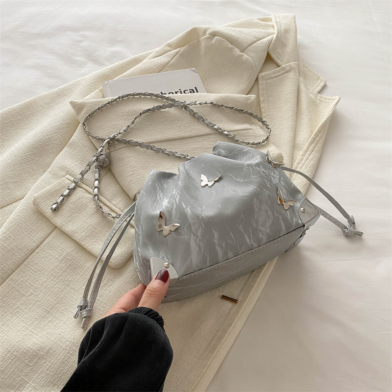 Bolso de cubo de mariposa súper fuego popular de este año primavera y verano nuevo bolso de cadena de todo fósforo de verano de moda bolso de hombro bandolera