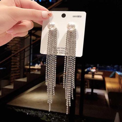 Stylish, exaggerated full-diamond tassel earrings for women—elegant, celebrity-inspired long drop designs that create a slimmer-looking face; trendy online ear accessories with eye-catching appeal.