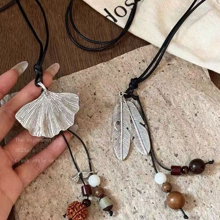 New Chinese Style Ginkgo Feather Tassel Necklace for Women 2025 New Retro Medieval Wear Matchinging Long Necklace New Chinese Style Ginkgo Feather Tassel Necklace for Women 2025 New Retro Medieval Wear Matchinging Long Necklace