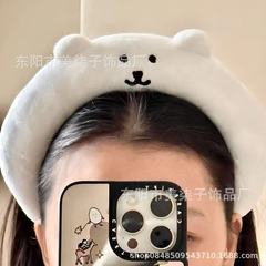 日本のかわいい自嘲熊弾力綿の毛のカチューシャは顔を洗って固定の髪の毛の飾りで写真を撮ります。