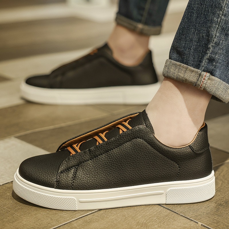 Zapatos de hombre de un pie de zapato 2025 primavera nuevos zapatos casuales de skate para hombres zapatos blancos sin correa estudiantes adolescentes