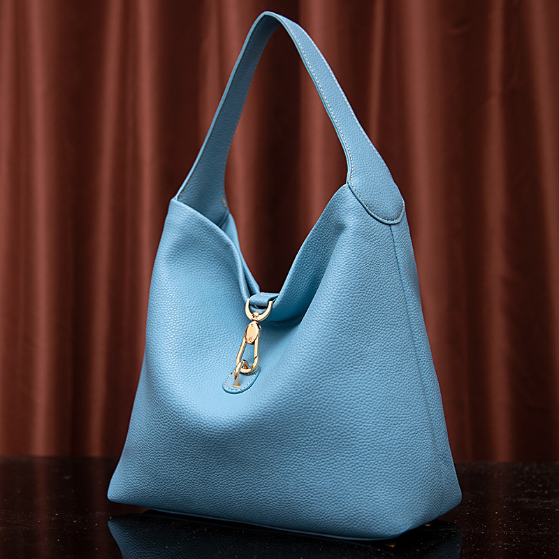 Neue handgehaltene Damen-Tasche mit körnigem Kieselmuster und einer Schulter unter dem Arm_voghion.com