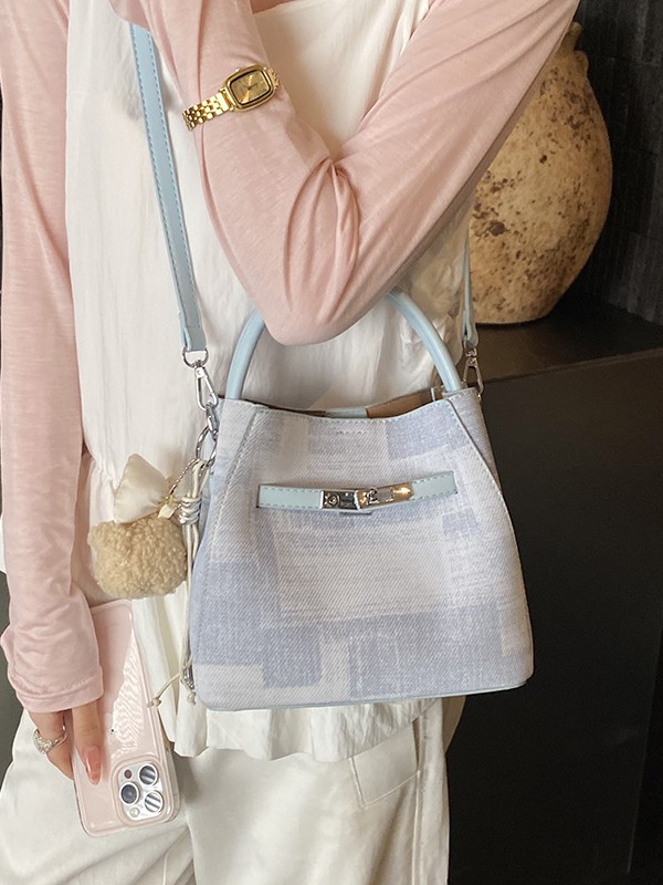 Comercio exterior transfronterizo coreano simple nicho de diseño de moda bolso de cubo para mujeres 2026 nuevo tipo de mujer mochila de hombro