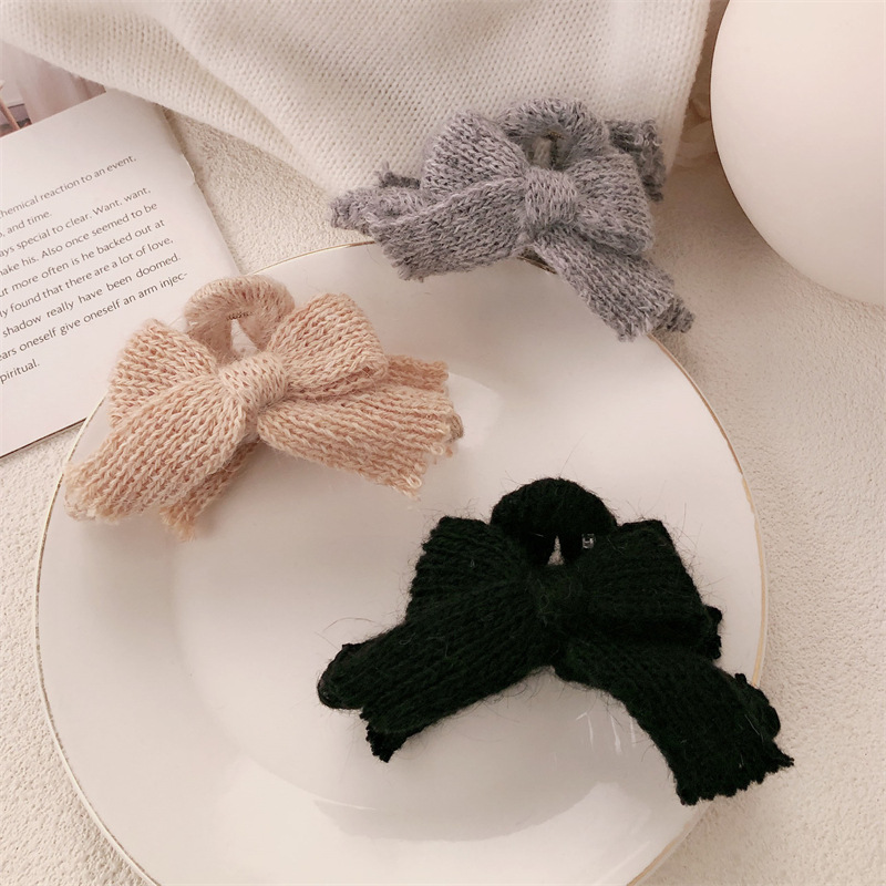 Otoño y invierno nuevo arco lana de punto pinzas de cabello de alta sensación otoño y invierno tocado de Año Nuevo rascar pinzas de pescado para mujeres