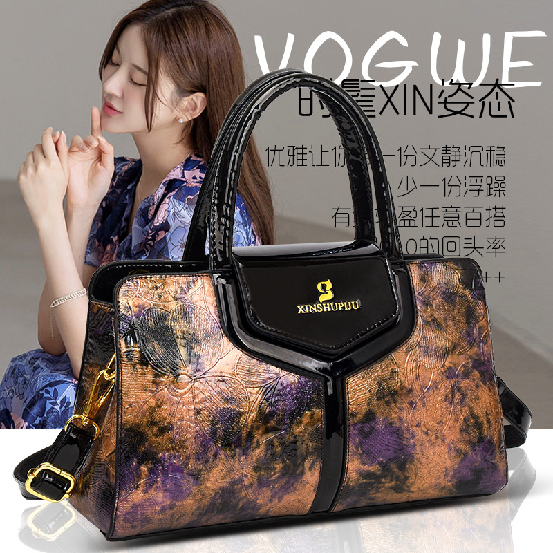 Bolso de hombro transfronterizo de moda de mujer, bolso de mano casual versátil, gran capacidad, sensación de alto nivel, bolso de mochila de estilo europeo y americano.