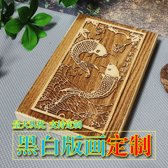 年に魚の木の版の年画の彫刻があります。