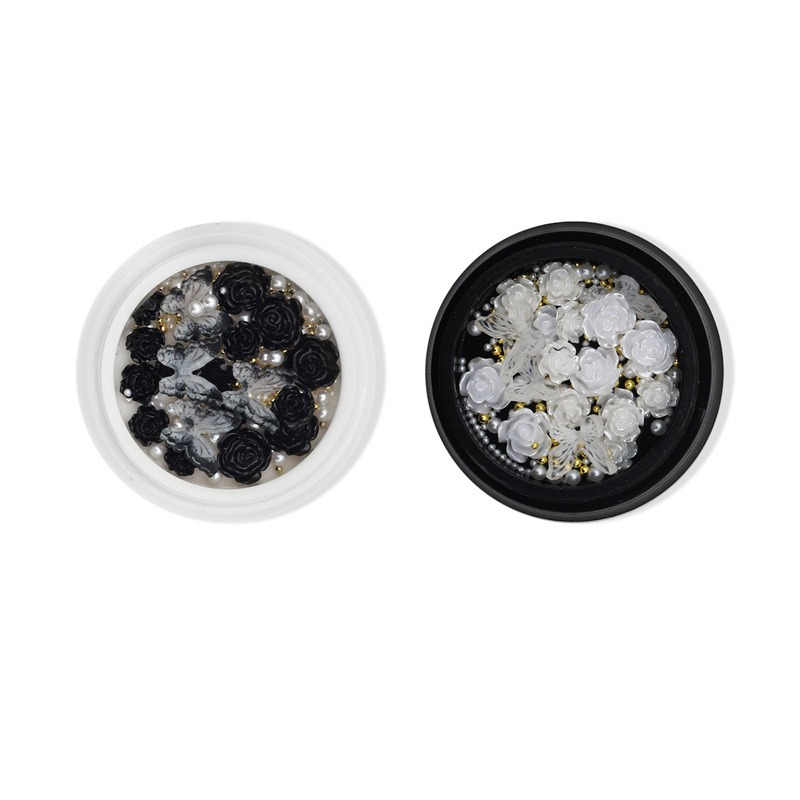 Internet celebridad nueva manicura blanco y negro Camellia perla joyería tridimensional mariposa oro bola de acero mezclado joyería de uñas