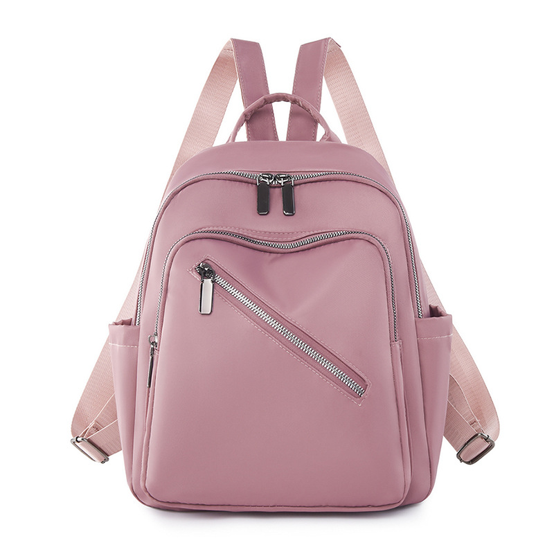 Comercio exterior al por mayor 2023 nueva mochila de nailon casual para mujer, mochila de viaje al aire libre literaria simple, mochila escolar