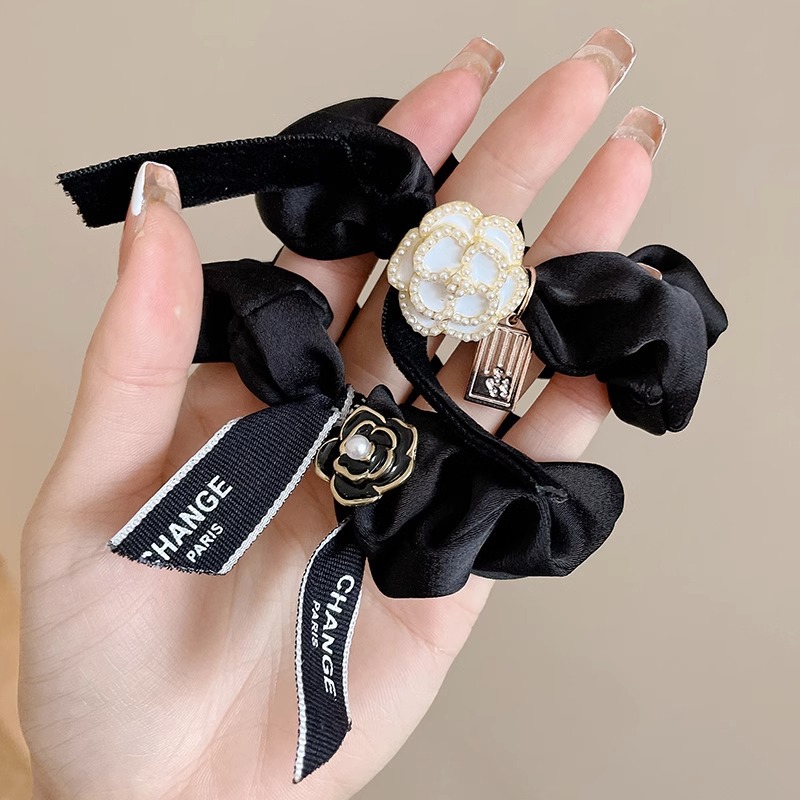 2023 nuevo tocado de cola de caballo alta banda de goma de temperamento Banda de pelo de intestino grueso de Flor Alta elástica diadema duradera lazo de pelo femenino