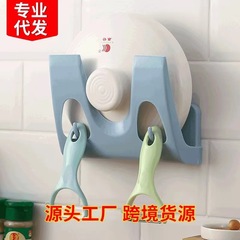 メーカー直売の鍋の蓋の棚の壁掛けは穴を開けないで台所のまな板の収納棚の壁のプラスチックの置物の収納棚を開けます。