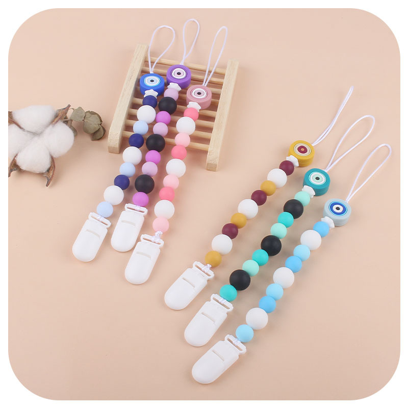 Nueva Cadena de chupete de silicona ojos creativos de dibujos animados juguete de silicona perlas molares Cadena de chupete cadena anti-gota