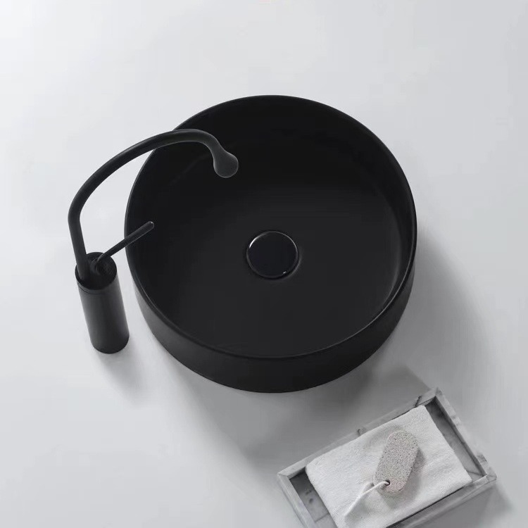 Estilo nórdico creativo mate negro lavabo pequeño tamaño lavabo de cerámica lavabo único lavabo balcón cuenca redonda