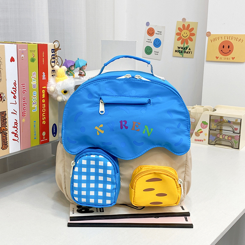 Nueva mochila infantil, jardín de infantes, mochila escolar ligera para niños y niñas, moda de color, mochila casual para padres e hijos.