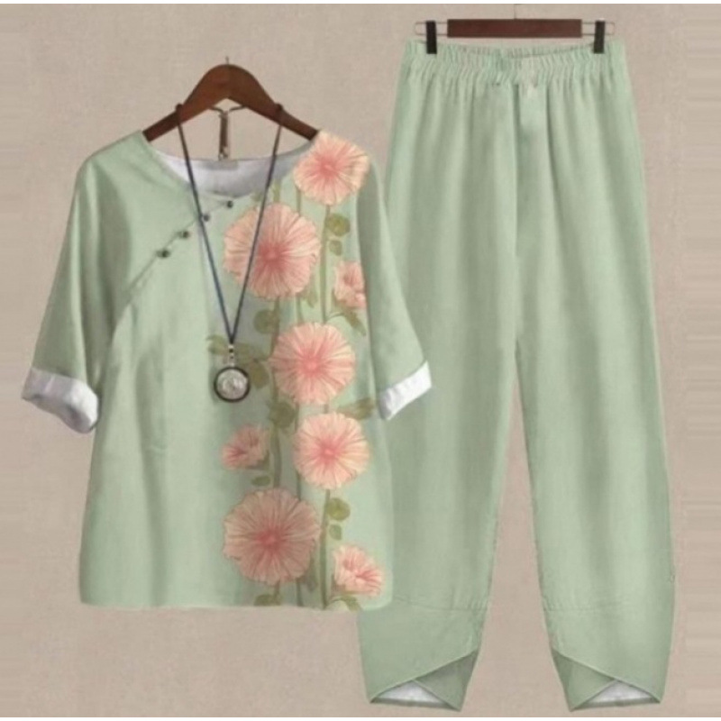 Europa y Estados Unidos trajes casuales de mujer transfronterizos de moda explosiva verano nuevo cinco mangas impresión chaqueta pantalones dos piezas