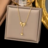 【H158】 Bow necklace golden color