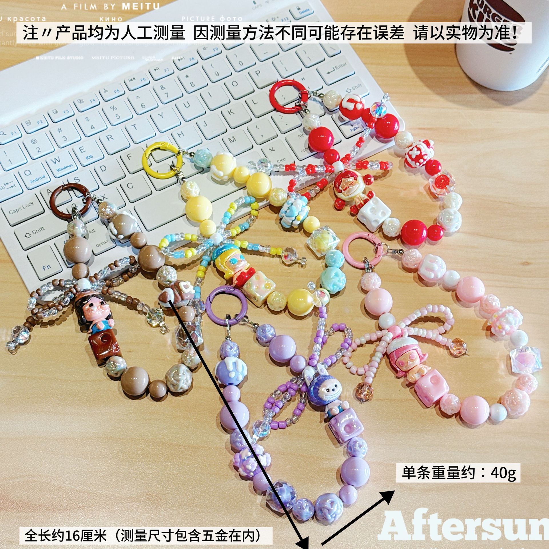 新商品のアニメの泡の瑪特の携帯のチェーンの玉の串の手の絵の玉のキーは布のバッククリップのペンダントを引っ張ります。