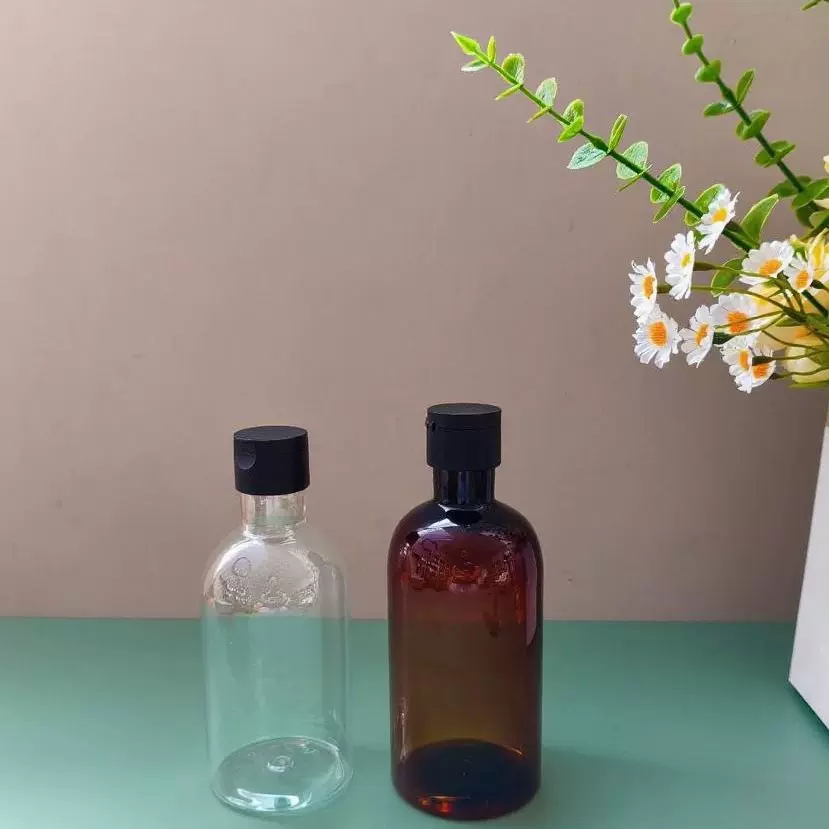 可定制400ml圆肩茶色pet瓶身体乳瓶精油分装瓶