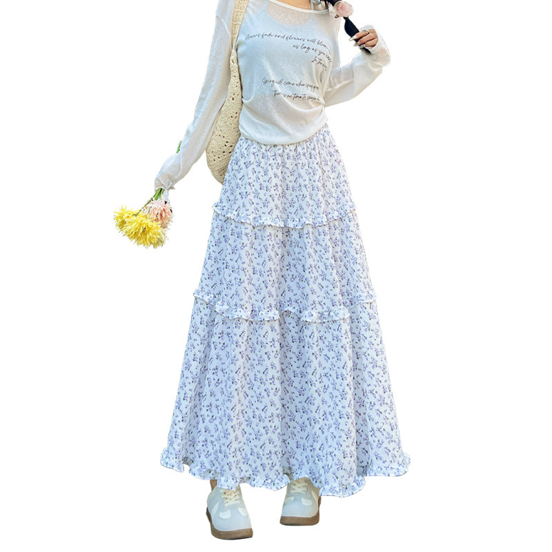 韓国式のレトロな青い花の半身のスカートの女性の春2025新型の高腰のa字のスカートのカジュアルな怠惰な長いスカート