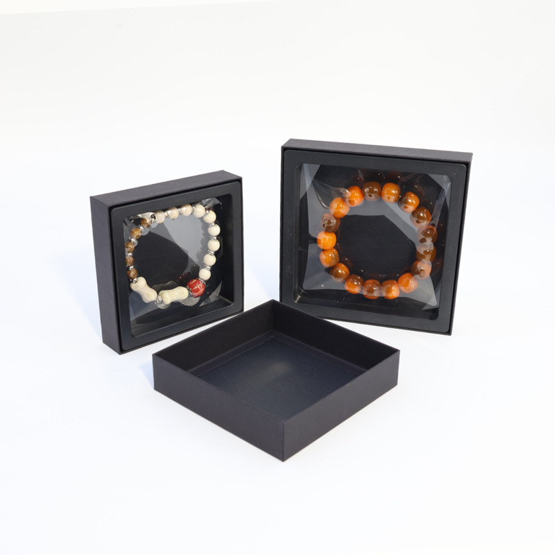 Caja de cajón de papel exterior multicolor extraída Caja de suspensión de almacenamiento Anillo de embalaje de red Caja de joyería de cristal antioxidante