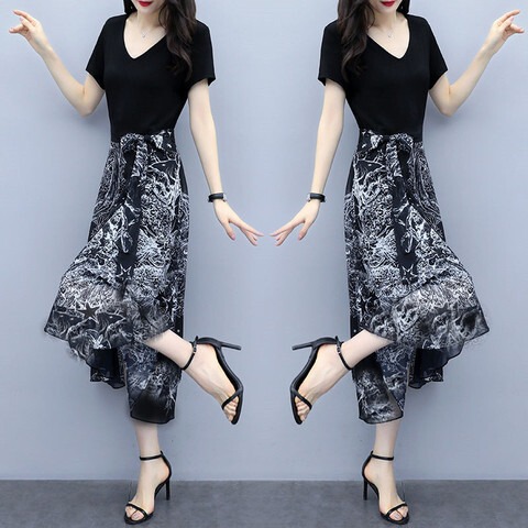 夏の婦人服の気質は腰を収めてやせている半袖のワンピースの女性が流行します。|undefined