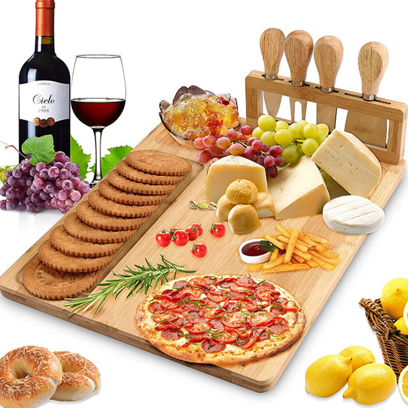 Plato de queso de bambú plato de queso traje de plato de comida cocinada bandeja de servicio conjunto de cuatro piezas cuchillo y tenedor vajilla ventas directas de la fábrica