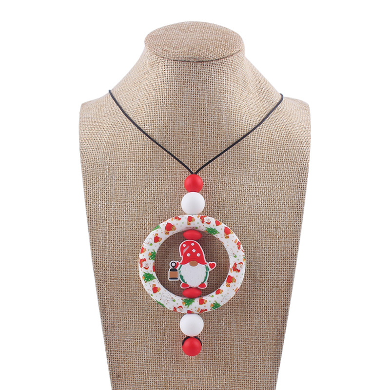 Bebé de dibujos animados de Navidad collar bebé creativo de silicona Santa Claus mordedura COLLAR COLGANTE hecho a mano