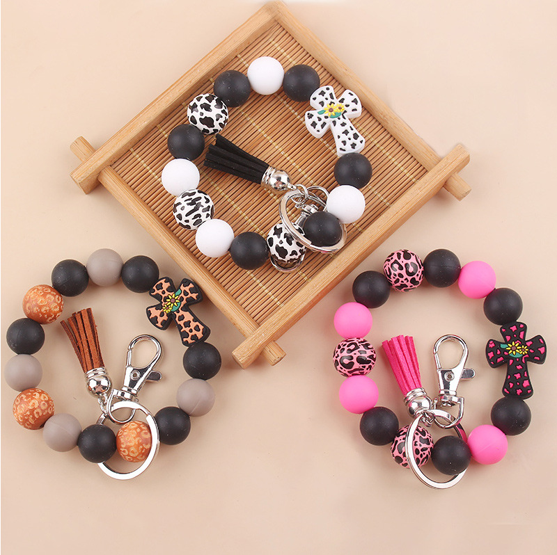 Korean Style Tassel Pu Leather Wood Silica Gel Women's Keychain display picture 1