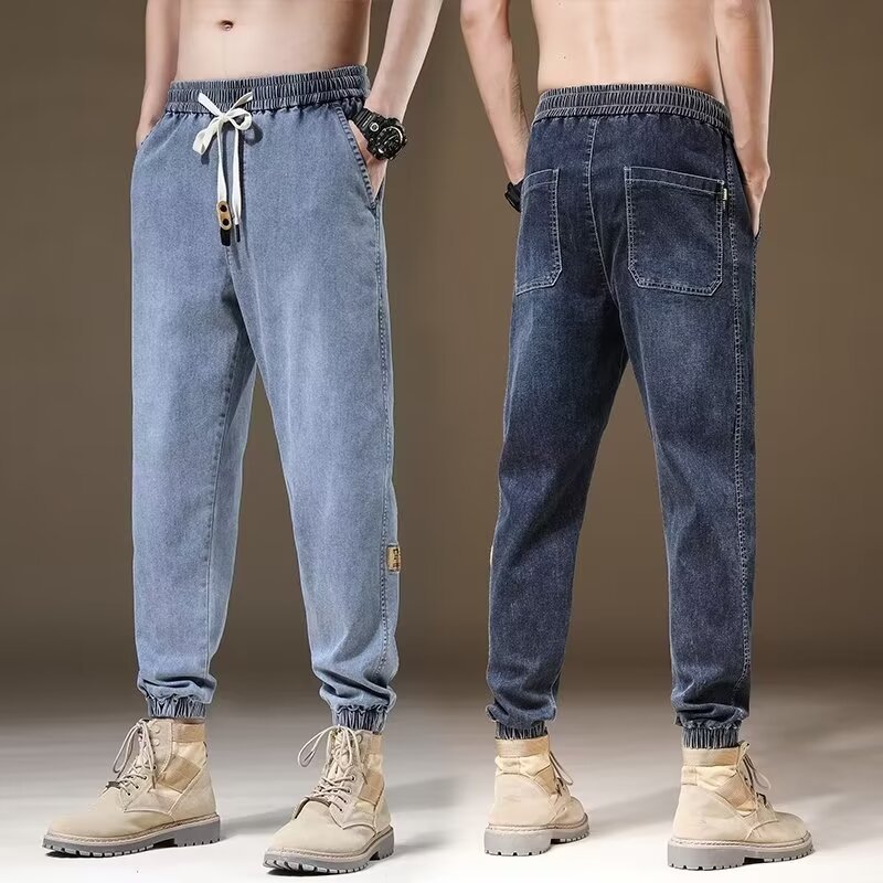 2024 primavera y otoño pantalones vaqueros de cintura elástica todo fósforo para hombres, pantalones de pierna ancha rectos sueltos para adolescentes de la calle principal