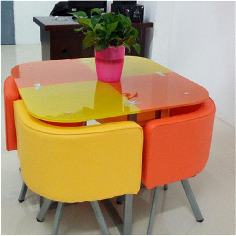 Mesa y sillas de comedor modernas, mesa redonda pequeña de vidrio templado, mesa y sillas para recepción y negociación, una mesa y cuatro sillas, cocina de inducción.