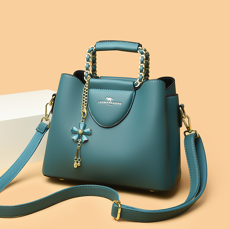 Nueva moda de hombro de las mujeres costura pequeño tamaño exquisito cubo bolsa de gran capacidad de cuero suave de una sola pieza de entrega para mamá más joven