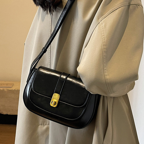 High-end bag women's autumn and winter retro 2024 new fashion niche design single shoulder crossbody bag popular saddle bag