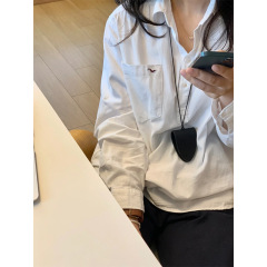 白い飛鳥刺繍の襟付きシャツの女性秋の韓国系はカジュアルでゆったりしています。
